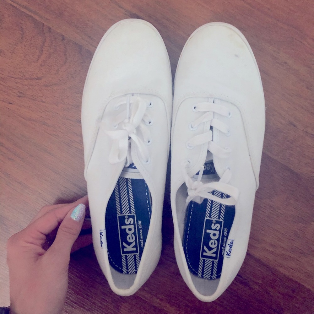 White keds lace up sneakers